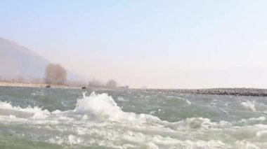 Fast flowing river with high waves