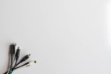 Different types of charging cables port closeup with copy space