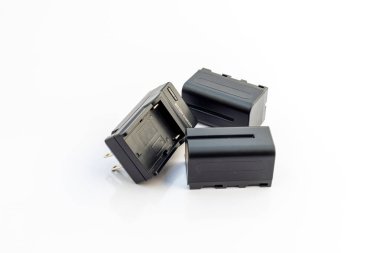 Rechargeable batteries with charger isolated on white background