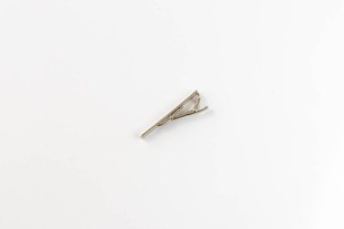 Tie pin isolated on white background