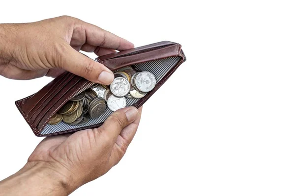 stock image Man holding a purse with full of coins isolated on white background