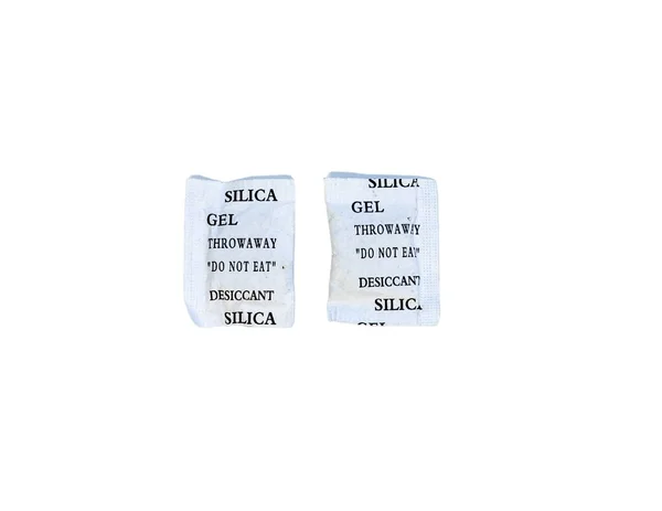 Packets of silica gel bags on isolated white background