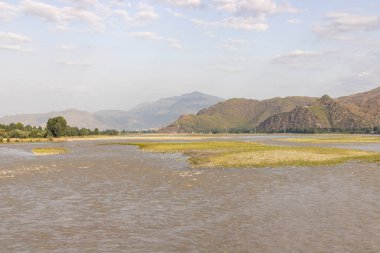 Flood in the river after heavy rain in the valley