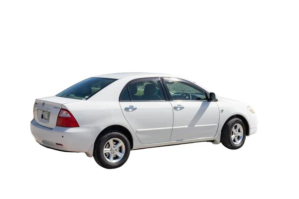 白色丰田Corolla Sedan 2006汽车侧面图 巴基斯坦斯瓦特 2023年10月10日 免版税图库照片