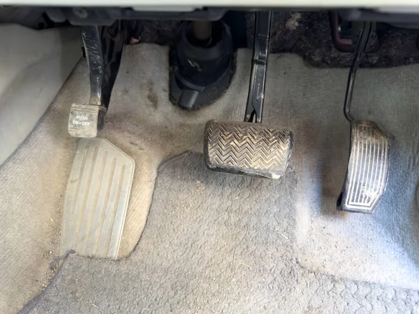 Parking foot brake of an automatic transmission vehicle
