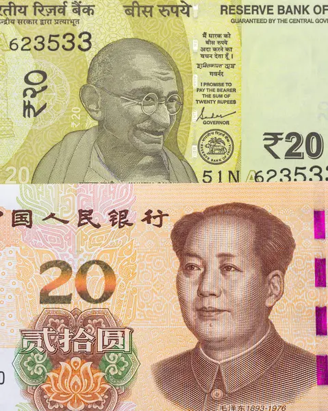 stock image Indian Rupee and Chinese Yuan Notes - Currency Comparison