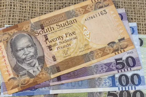 stock image Dr.John Garang de Mabior portraits from South Sudan pounds banknotes closeup