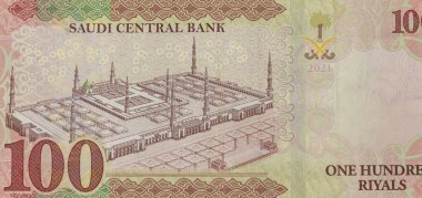 Saudi Arabia one hundred riyals banknote reverse side features the Prophet's Mosque, Al Madinah Al Monawarah (Masjid Nabawi). clipart