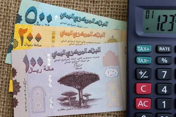 stock image Yemen 100, 200 and 500 rial banknotes with calculator