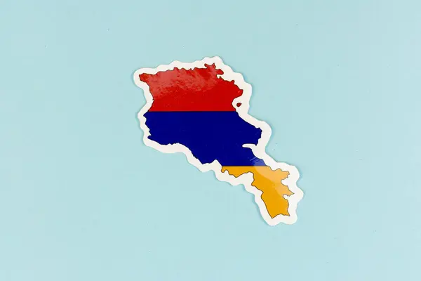 stock image Armenia Flag Sticker in Country Shape on Blue Background