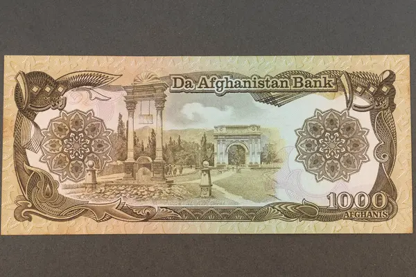 stock image Afghanistan 1000 Afghanis banknote featuring Taq-e Zafar and Lion Gate.