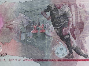 Portrait of Football players, fish and dancers from Maldives 10 rufiyaa banknote clipart