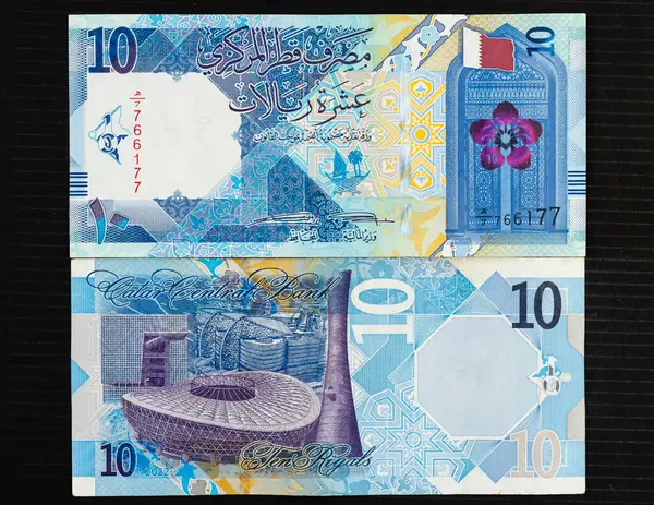 stock image Qatar 10 riyals newly launched currency note observe and reverse sides on black background