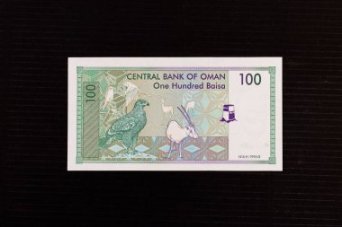 Omani 100 Baisa Note Featuring Verreaux eagle and white oryx portrait (1995 Series) clipart