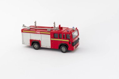 Toy fire truck isolated on white background clipart