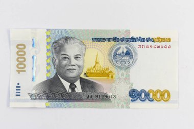 Laos 10,000 Kip banknote features president Kaysone Phomvihane clipart