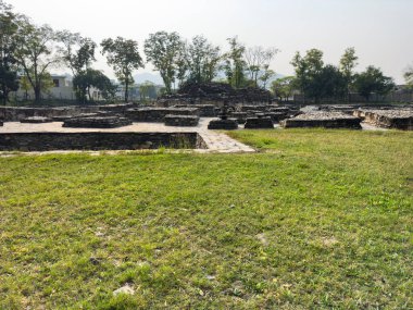 Butkara Stupa in Mingora Swat, Pakistan built in the 2nd century BCE. clipart