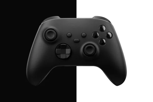 黒と白の背景を持つゲームコントローラ — ストック写真