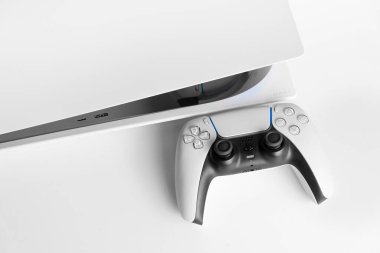 Playstation 5 and Dual Sense controller in close view, 27 Fev, 2023, Sao Paulo, Brazil clipart