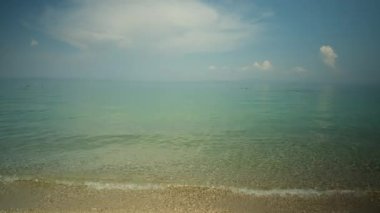 Kriopighi, Greece - August 31, 2022 : The crystal clear waters of the Kriopigi beach in Chalkidiki Greece