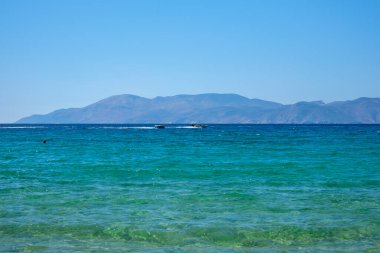 Ios, Greece - September 15, 2022 : View of speed boats in the distance Ios Greece