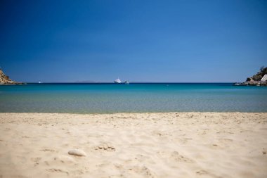 The stunning turquoise white sandy beach of Kolitsani View in Ios Cyclades Greece