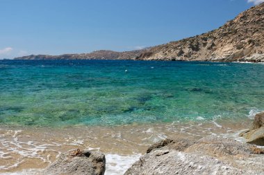 The beautiful dream turquoise sandy beach of Sapounohoma in Ios Greece