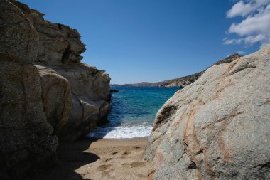 The beautiful dream turquoise sandy beach of Sapounohoma in Ios Greece