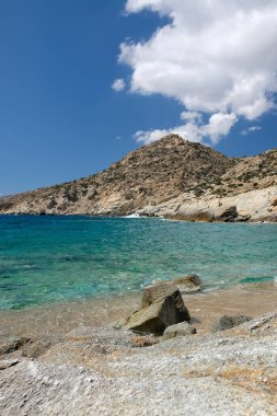 The beautiful dream turquoise sandy beach of Sapounohoma in Ios Greece
