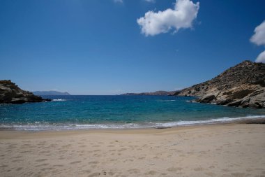 The beautiful dream turquoise sandy beach of Sapounohoma in Ios Greece