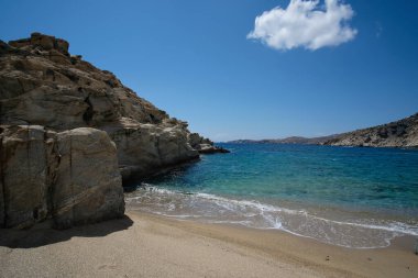 The beautiful dream turquoise sandy beach of Sapounohoma in Ios Greece