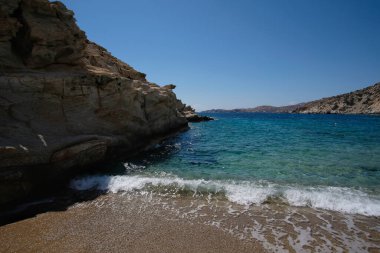 The beautiful dream turquoise sandy beach of Sapounohoma in Ios Greece