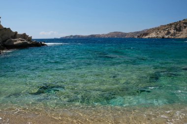 The beautiful dream turquoise sandy beach of Sapounohoma in Ios Greece