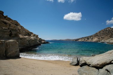 The beautiful dream turquoise sandy beach of Sapounohoma in Ios Greece