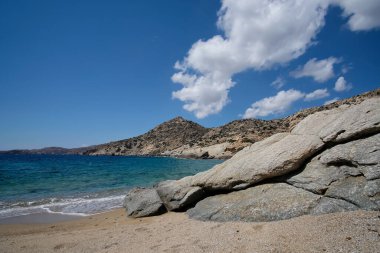 The beautiful dream turquoise sandy beach of Sapounohoma in Ios Greece