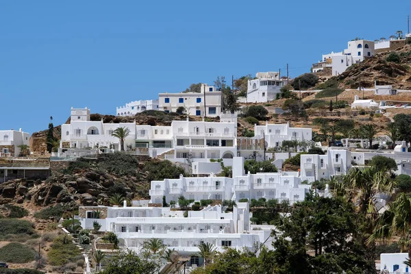 stock image View of a luxury whitewashed hotels with balconys in Ios Greece