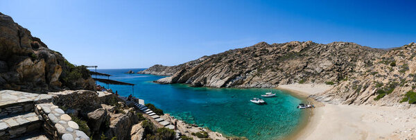 Ios, Greece - September 15, 2023 : View Panoramic view of one the most amazing turquoise beaches of Greece,  Tripiti beach on the island of Ios Greece