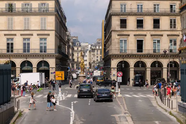 stock image Paris, France - August 2, 2024 : View of the statue of Joan of Arc, at a busy crossroad in Paris France