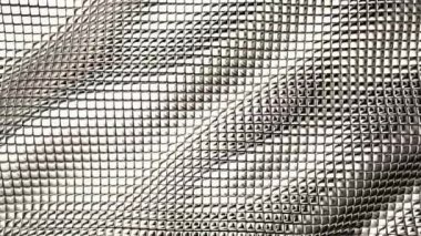 A Floating Wall of Silver Cubes radiating Metallic Shine designed as an Elegant and Premium Background for Luxury Projects