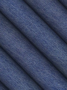 Moda Oluşturma İçin Yuvarlanan Mavi Denim 'in Yakın Çekimi