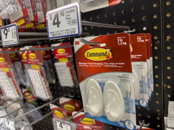 stock image Seattle, WA USA - circa June 2022: Close up view of Command Strip products for sale inside a Lowe's home improvement store.