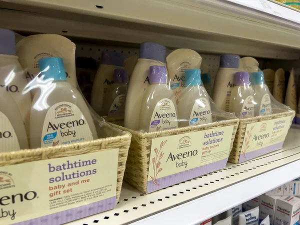 Stock image Seattle, WA USA - circa August 2022: Close up focus on Aveeno baby wash products for sale inside a Target retail store.