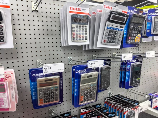 stock image Seattle, WA USA - circa November 2022: Close up view of calculators for sale inside a Staples store