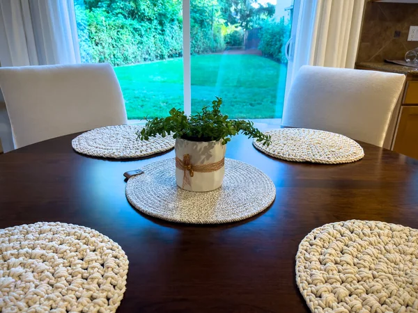 Wide View Dark Wood Table Four Knit Place Mats Green — Stock Photo, Image