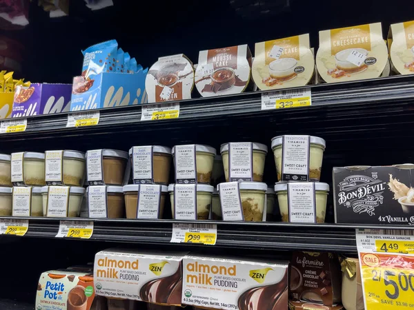 stock image Snohomish, WA USA - circa November 2022: Close up view of refrigerated desserts for sale inside a Haggen grocery store.