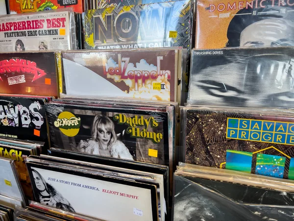 stock image Kirkland, WA USA - circa November 2022: Selective focus on used vinyl and laser discs for sale inside Vortex Music and Movies store.