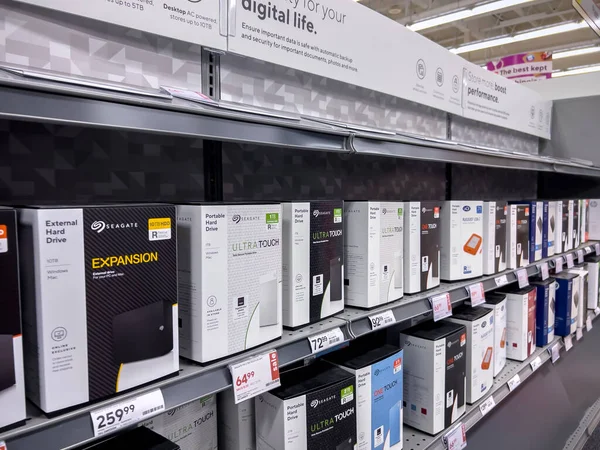 stock image Seattle, WA USA - circa October 2022: Close up view of portable hard drives for sale inside a Staples retail store.