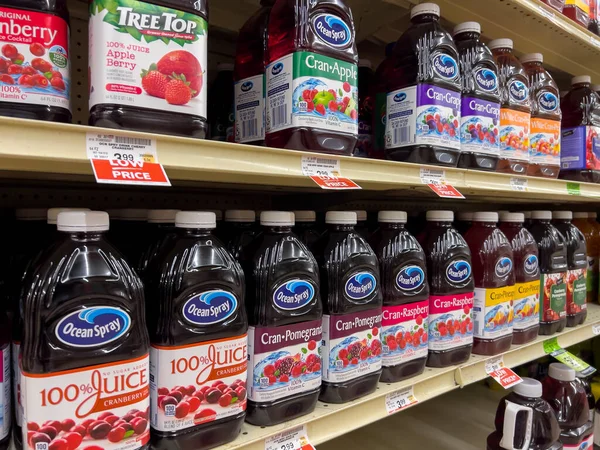 Seattle, WA USA - circa December 2022: Angled view of Ocean Spray juice products for sale inside a grocery store.