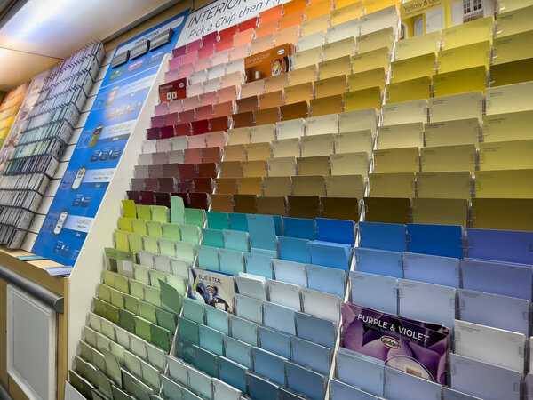 Seattle, WA USA - circa December 2022: Angled view of paint swatch cards inside the paint department inside a Walmart store.