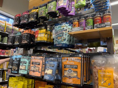 Mill Creek, WA USA - circa December 2022: Close up view of freeze dried pet treats for sale inside a Mud Bay pet shop.